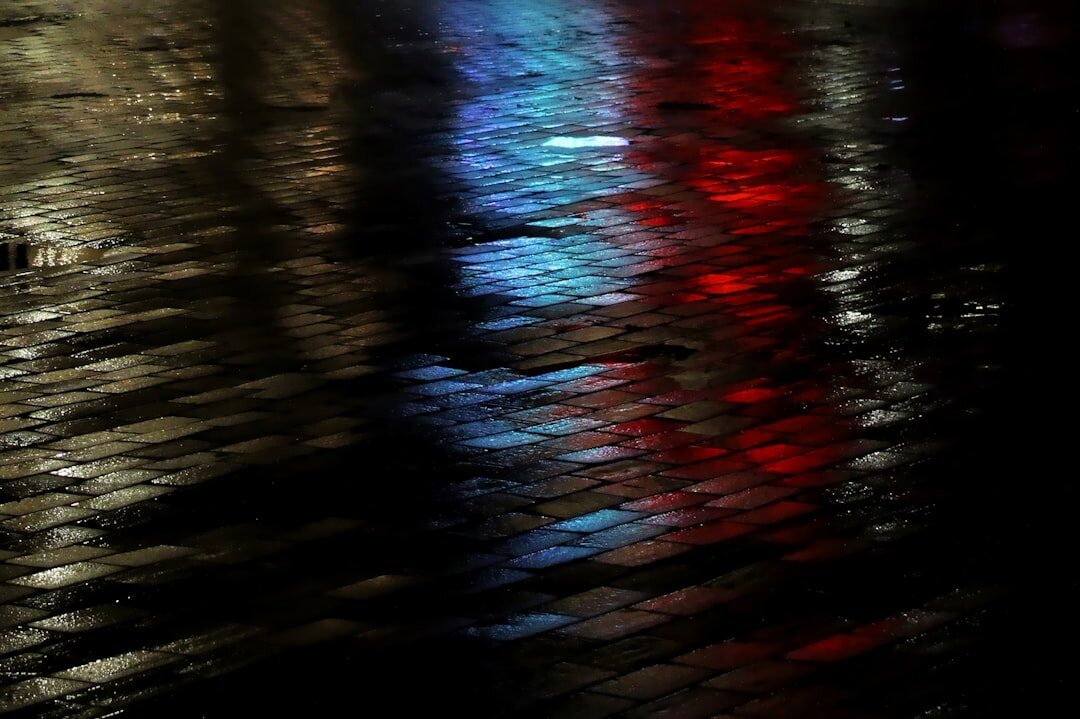 rainy city street at night