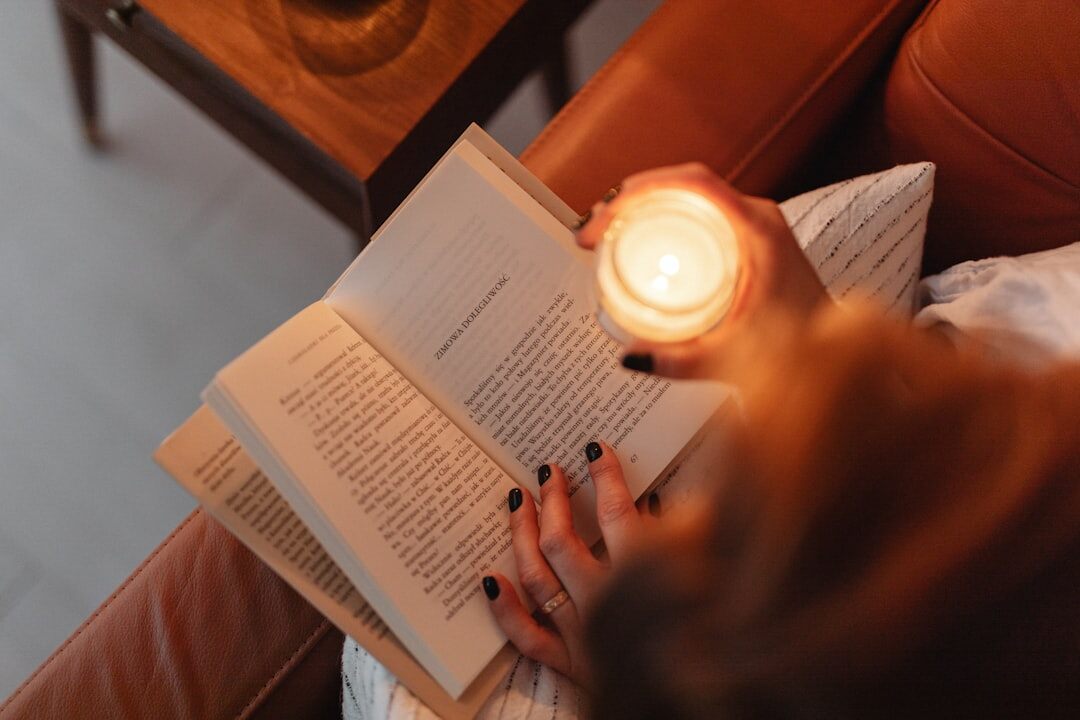 person reading mystery book